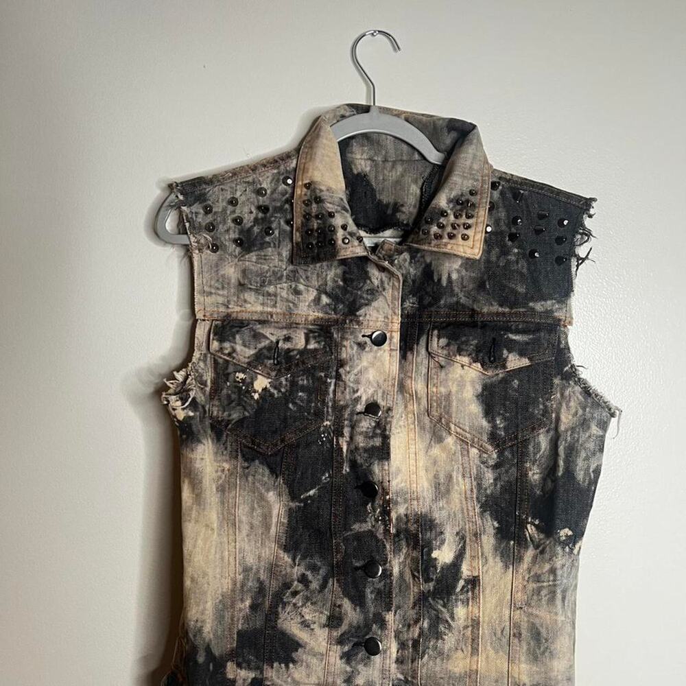 Vintage like bleach distressed with studs and cheeta print fur